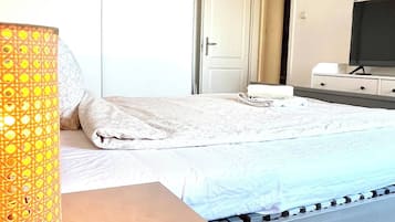 1 habitación, tabla de planchar con plancha, internet y ropa de cama