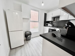 Oven, cookware/dishes/utensils