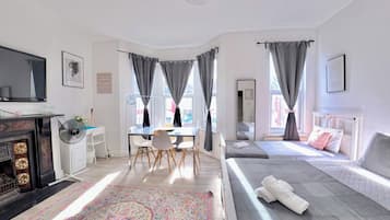 Laptop workspace, free WiFi, bed sheets