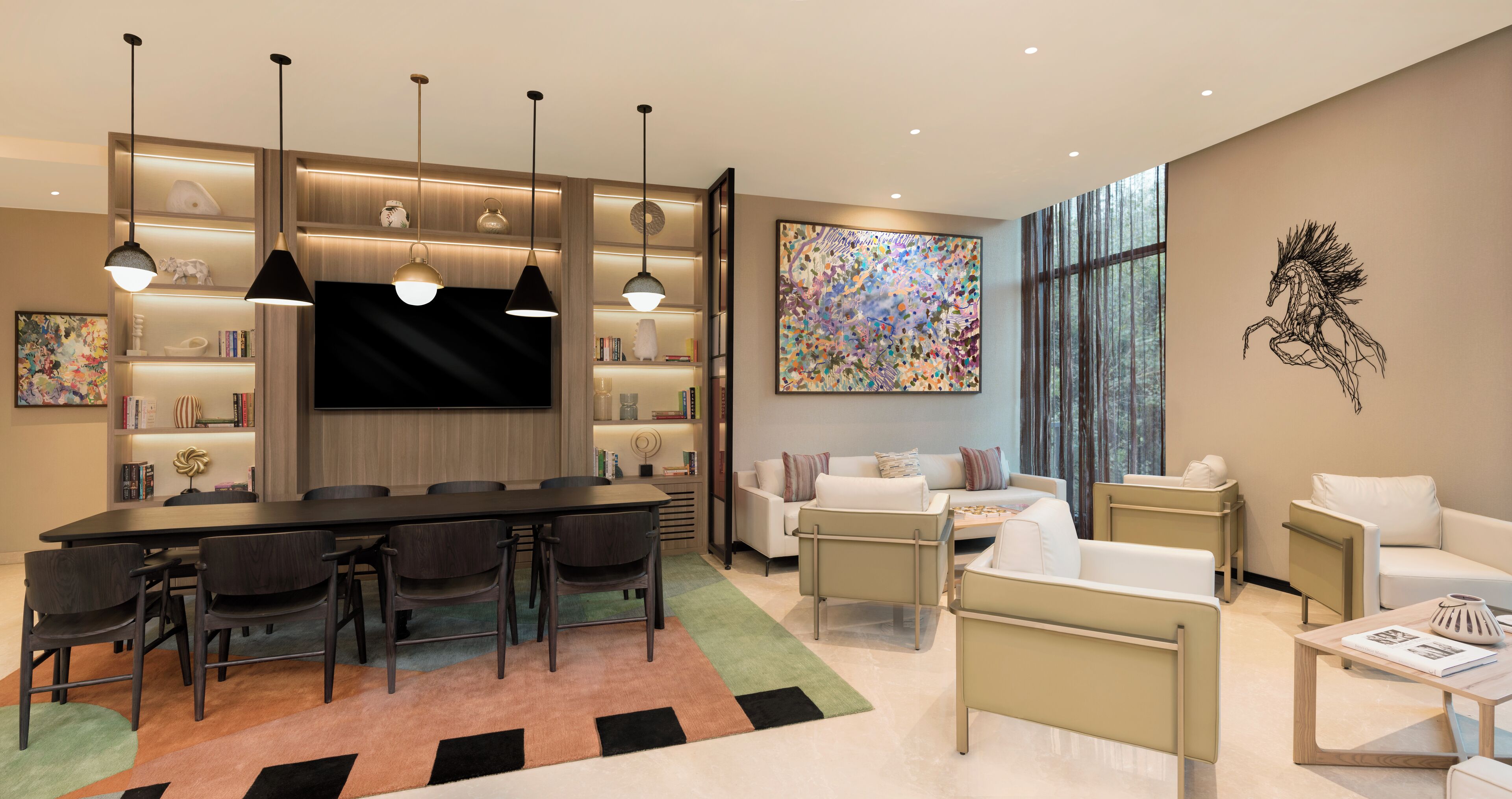 A modern living room with a dining area, featuring a large TV, bookshelves, and a colorful abstract painting.