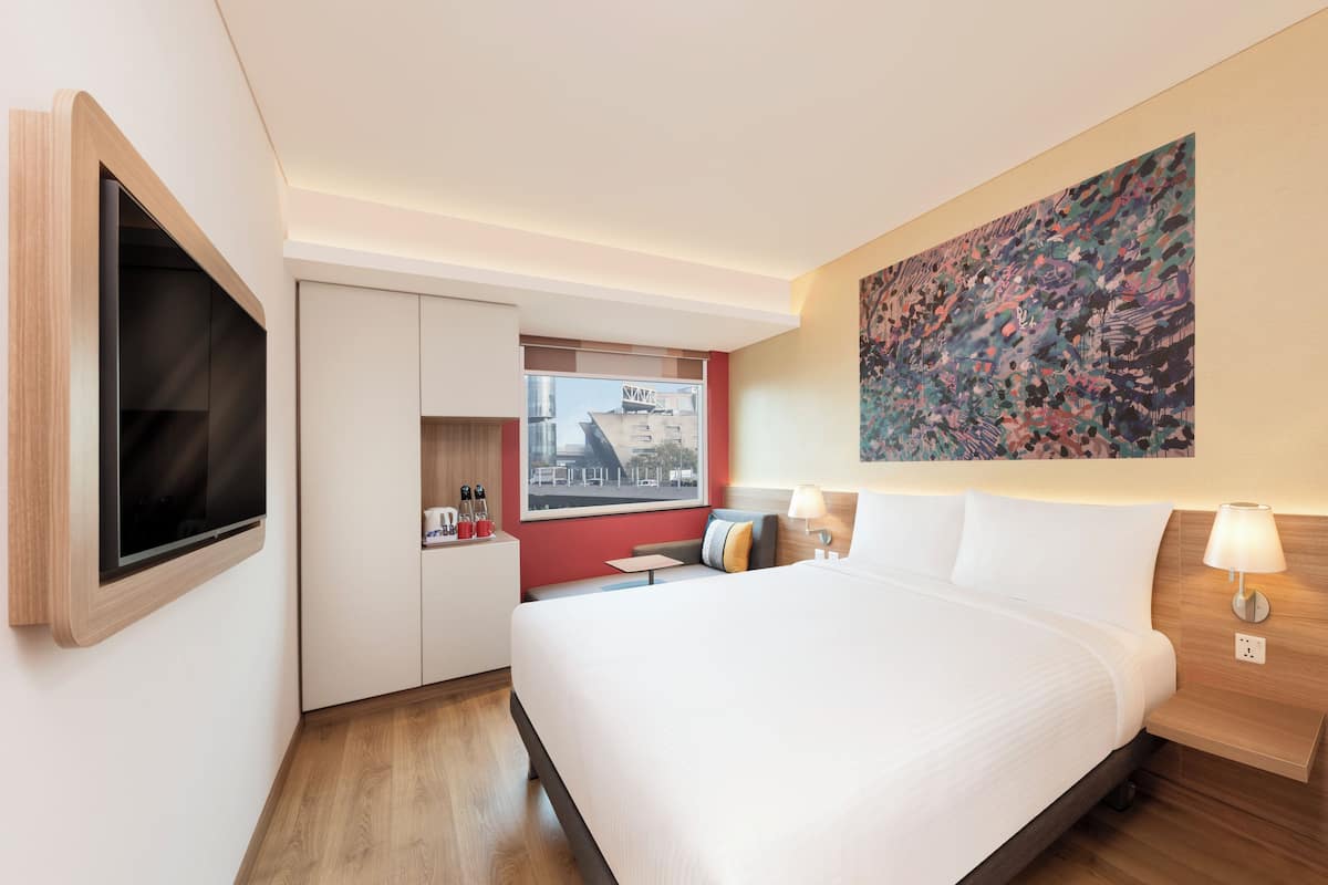 Premium bedding, down comforters, pillowtop beds, minibar