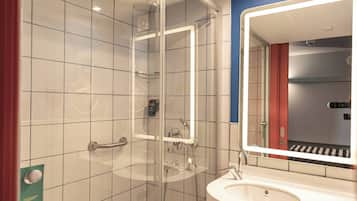 Un baño moderno con ducha envuelta en vidrio, un lavamanos blanco e iluminación integrada en un espejo.