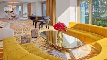 Suite, 3 Bedrooms (Faena) | Living area | 70-inch Smart TV with digital channels