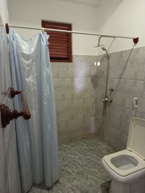Economy Double Room | Bathroom | Shower, towels, soap, toilet paper
