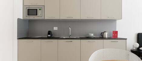 Køleskab, mikrobølgeovn, opvaskemaskine, kaffe-/temaskine