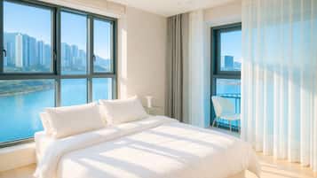 Habitació doble Deluxe | Espai de treball apte per a portàtils i cortines opaques