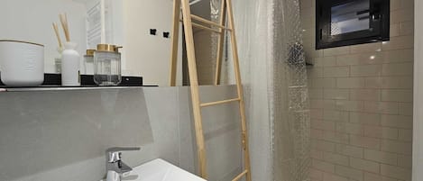 Hair dryer, towels, soap, toilet paper