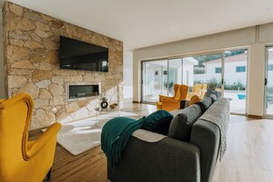 Comfort House, Garden View | Living area | Flat-screen TV