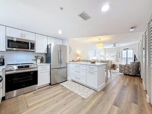 Fridge, microwave, oven, stovetop - Beach Gem - All the perks, views, parking, wifi, beach gear and more! (St. Pete Beach)
