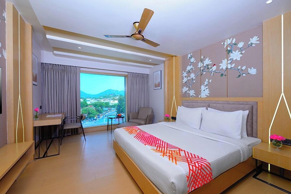Premium bedding, desk, laptop workspace, soundproofing