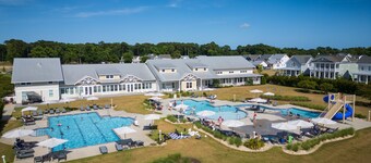 Modern Coastal Retreat in Bay Creek Featuring Access to Club Amenities!