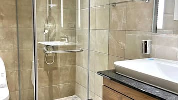 Luxury Suite, City View | Bathroom | Shower, free toiletries, slippers, towels