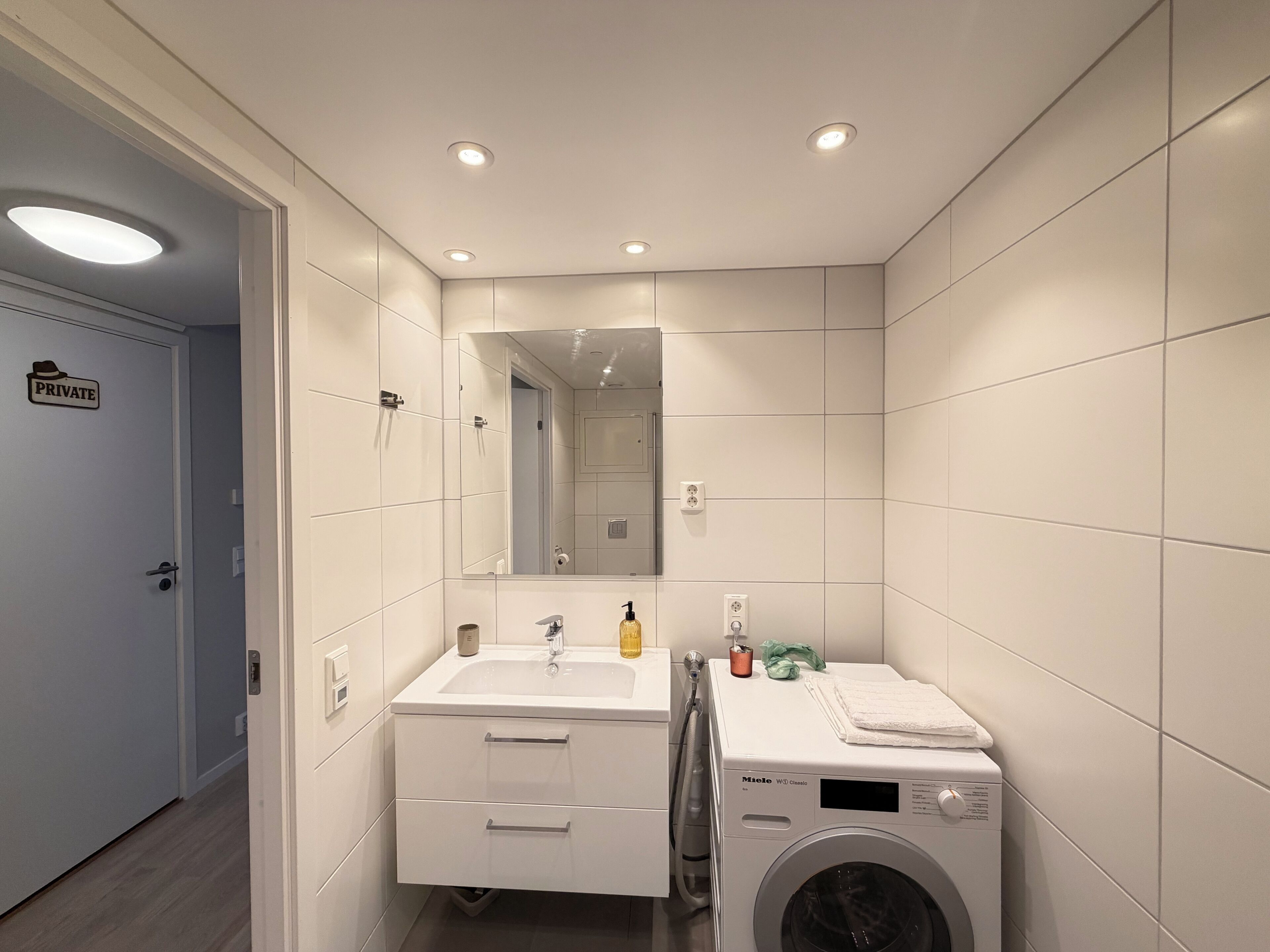 Shower, towels, soap, toilet paper