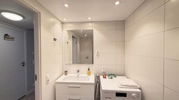 Shower, towels, soap, toilet paper