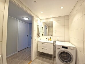 Shower, towels, soap, toilet paper