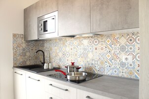 Apartment | Private kitchen | Full-size fridge, dining tables