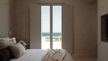 Suite Deluxe, vistas al mar | Sábanas de algodón egipcio y ropa de cama de alta calidad