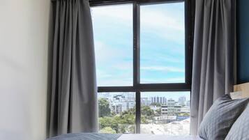 Desk, laptop workspace, free WiFi, bed sheets