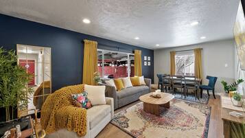 Smart TV, fireplace, books, music library