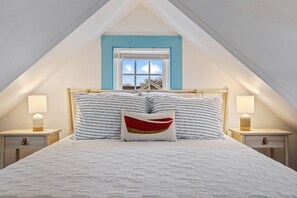 The cottage’s first bedroom includes a cozy queen bed - Steps to Beach & Downtown OGT | Porch w Ocean View (Ogunquit)