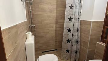 Standard Room, Patio | Bathroom | Shower, free toiletries, towels, soap