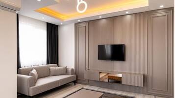 Appartement Familial, balcon | 1 chambre, espace de travail pour ordinateur portable