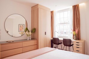 1 habitación, tabla de planchar con plancha, cuna de viaje y wifi
