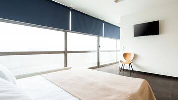 Blackout curtains, iron/ironing board, free WiFi, bed sheets