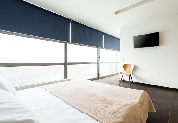 Cortinas blackout, tabla de planchar con plancha y wifi gratis