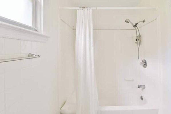 Hair dryer, towels, soap, toilet paper