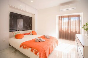 2 slaapkamers, een strijkplank/strijkijzer, internet, beddengoed
