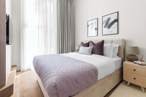 1 dormitorio, tabla de planchar con plancha, cuna de viaje y wifi