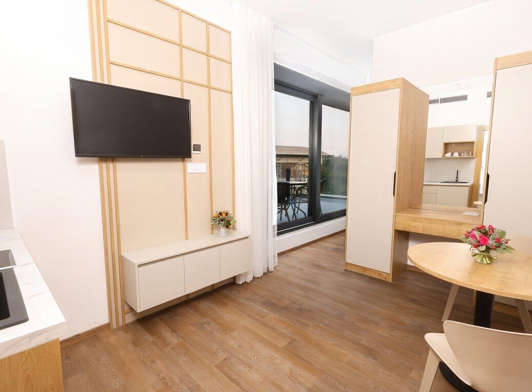 Standard Studio Suite | Living area | 40-inch LED TV with digital channels