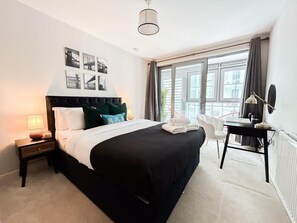 2 habitaciones, tabla de planchar con plancha, cuna de viaje y wifi