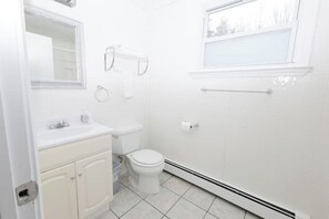 Hair dryer, towels, soap, toilet paper