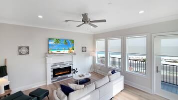 Een smart-tv, een open haard en videogames