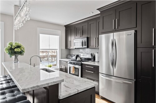 Luxury Brownstone Condos with Private Roofdeck & Stunning City Views!