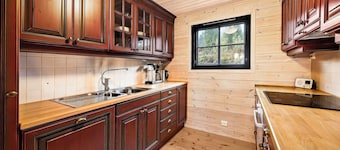 Marit's Hytte is a typical Norwegian holiday home, suitable for 6 to 8 people. Enjoy the fantastic view from the spacious veranda of this house.