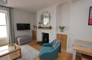 Smart-TV, peis og bøker