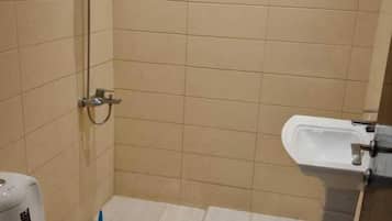 Shower, towels, soap, shampoo