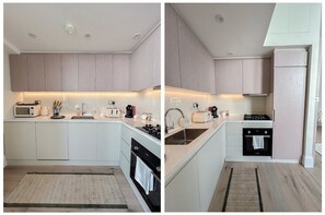 Enjoy cooking in this well-equipped kitchen with a central island, oven, and standard appliances.