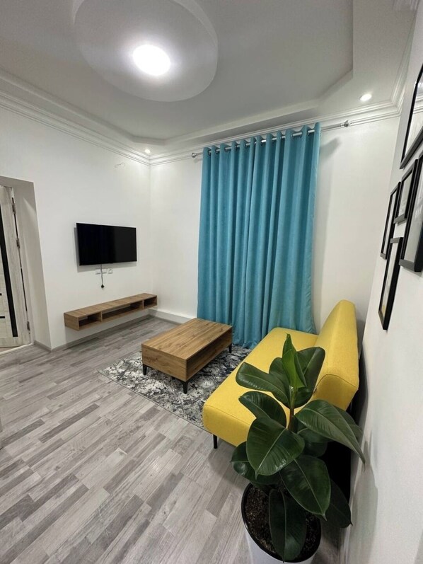 Living area - A Cozy Apartment by RETRI HOUSING (Tashkent)