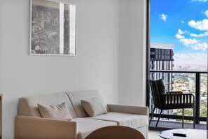 Living area - Skyline Retreat Chic 1-BR with City View (Miami)