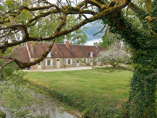 Pretty farmhouse on the edge of a village