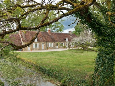 Pretty farmhouse on the edge of a village