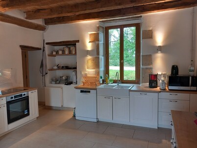 Pretty farmhouse on the edge of a village