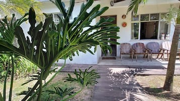 Suíte standard, vista para o jardim | Área de estar