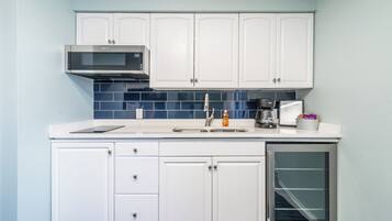 Microwave, stovetop, coffee/tea maker, toaster