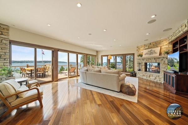 Smart TV, fireplace, books, stereo