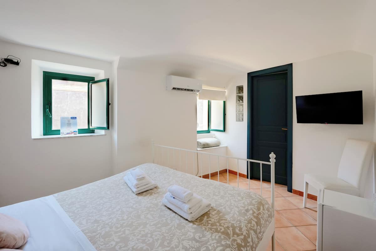 Economy Double Room | Down comforters, minibar, blackout drapes